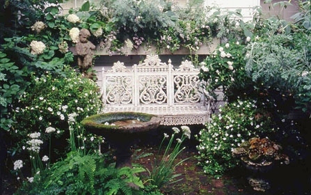 bench,  birdbath and  enchanted garden