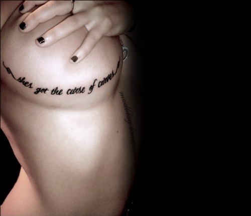 cute is what we aim for,  lyrics and  tattoo