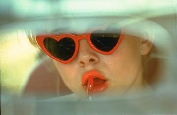 heart shaped sunglasses,  lipstick and  lolita