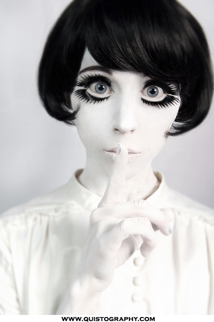 black and white, blue and doll