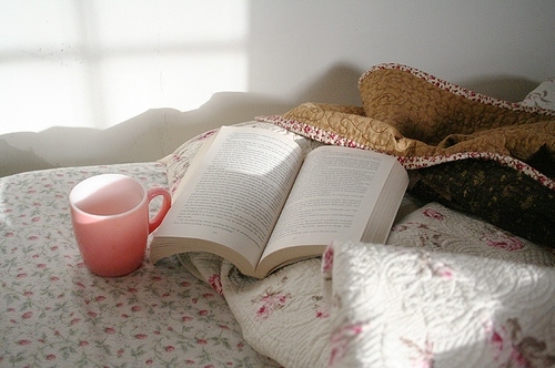 bed, book and coffee