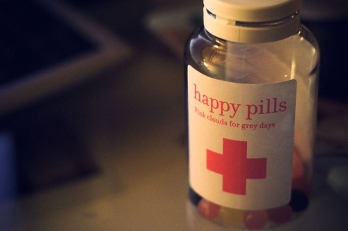 bottle, candies and happy pills