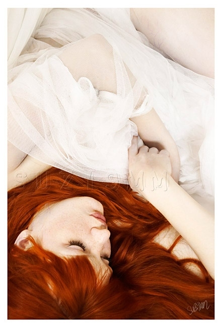 eyes closed, pale and red hair