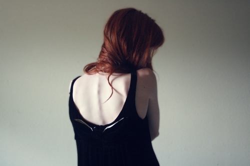 back, black dress and bones