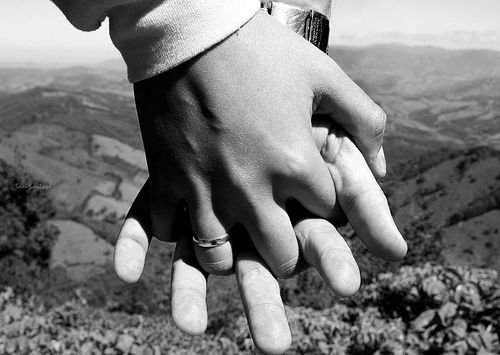 couple, hands and landscape