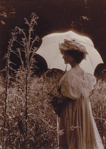 early 20th century, field and parasol