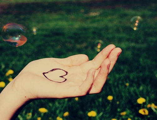 bubbles, dandelions and hand