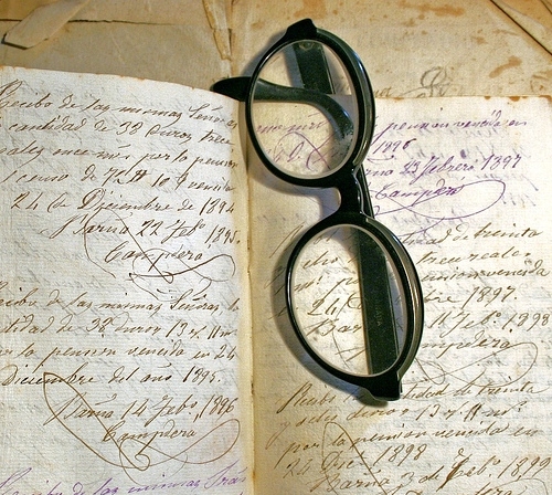 book, glasses and notebook
