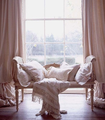 bench, blanket and curtains