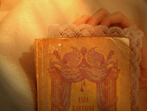 anna karenina, book and gold