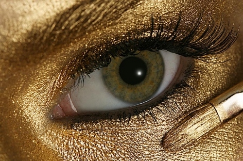 eye, face paint and gold