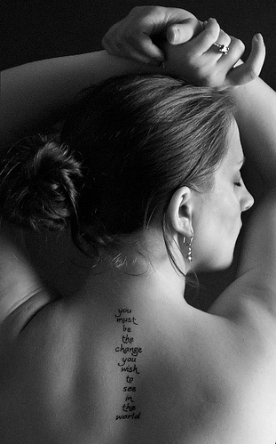 black and white ghandi sleeping tattoo woman words