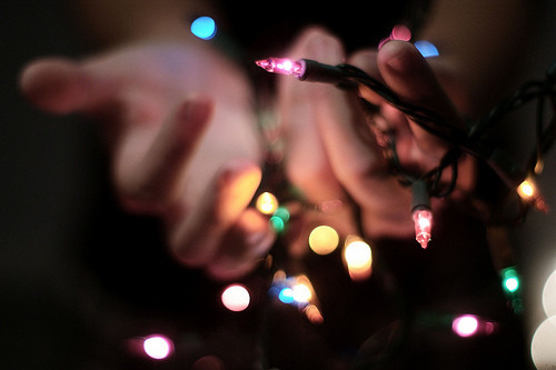 bokeh, christmas lights and hands