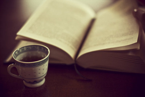 bokeh, book and cup