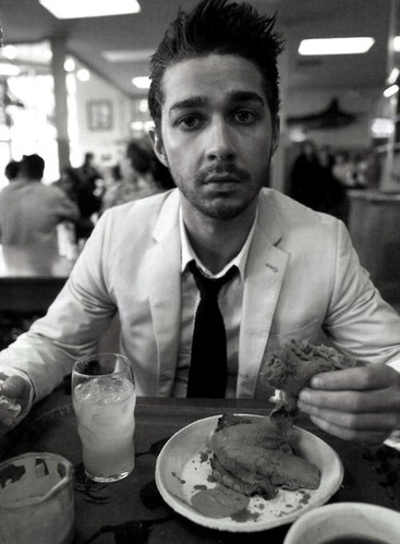 black and white, diner and eating sandwich man