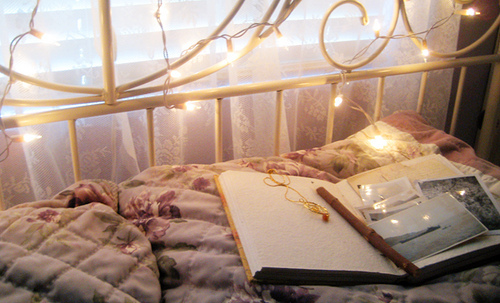 bed,  book and  christmas lights