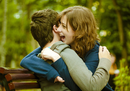 bench, couple, happy, hugging, sitting, smiling