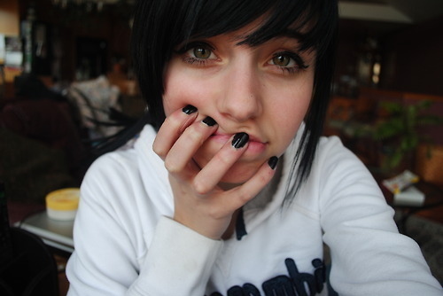 black hair, black nails and brown eyes