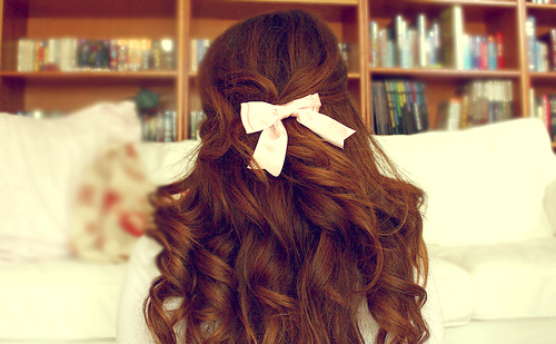 big curls,  books and  bow