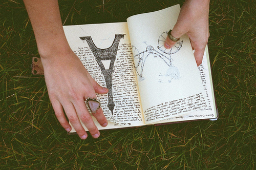 book, eiffel tower and grass