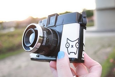 camera,  cat and  diana