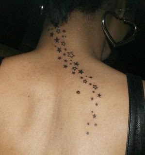 back tattoo,  rihanna and  star tattoo
