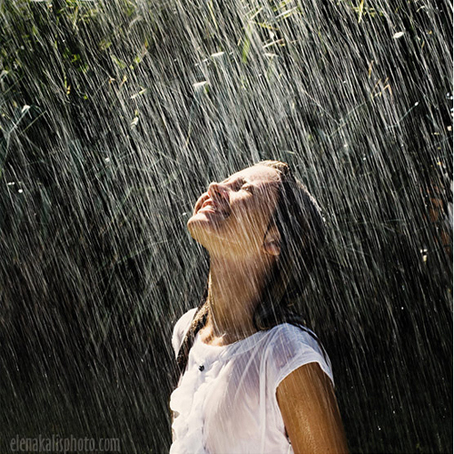 girl-happy-rain-rainy-days-smile-wet-Favim.com-71335.jpg