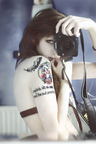 camera girl nikon skinny tattoo Added Jun 12 2011 Image size