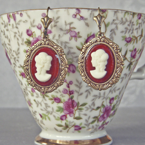 cup, earrings and old