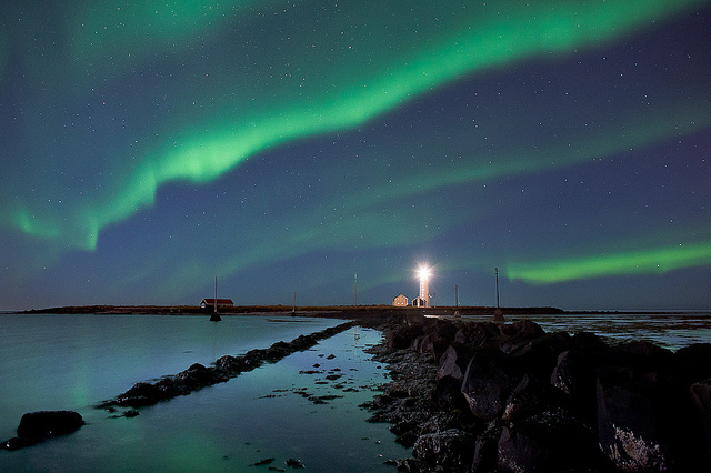 aurora borealis, breakwater and lighthouse