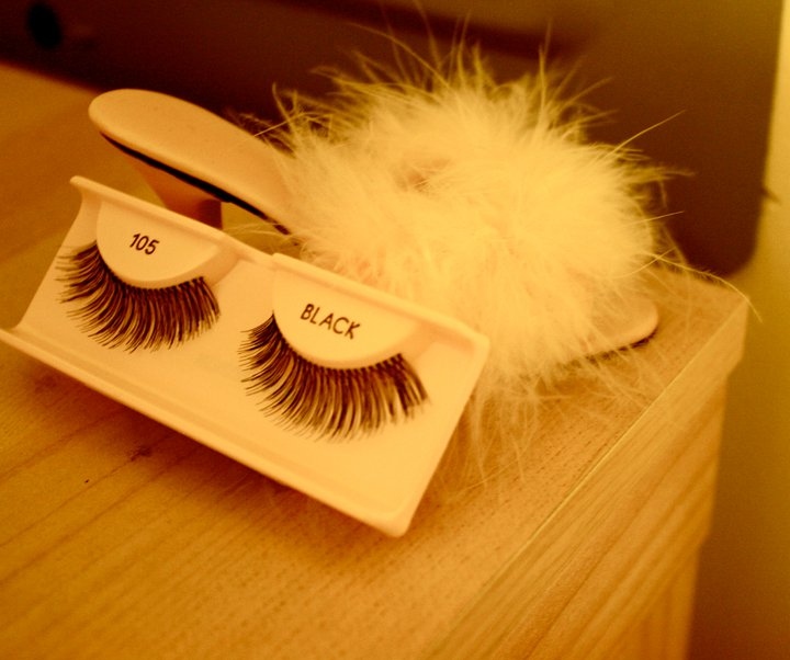 eye lashes, falsies and feathers