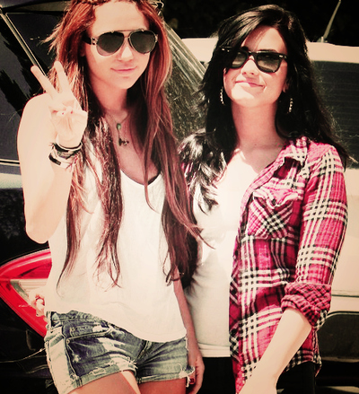 candids, cyrus and demi