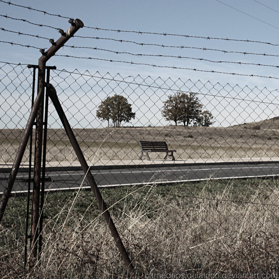 barbed wire, bench and fence
