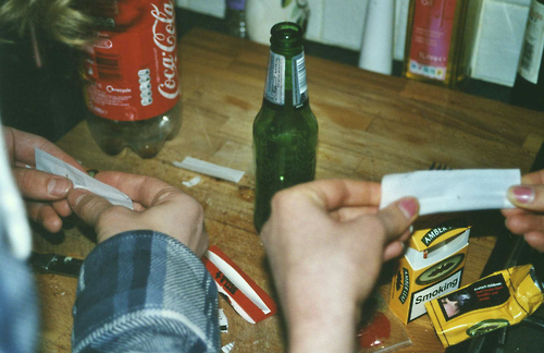 bottles, cigarettes and coke