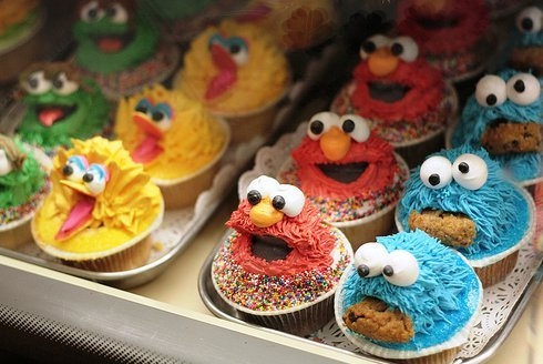 big bird, cookie monster and cupcakes
