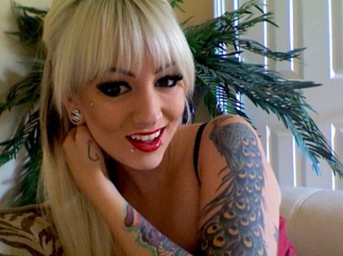 blonde, piercing and plugs