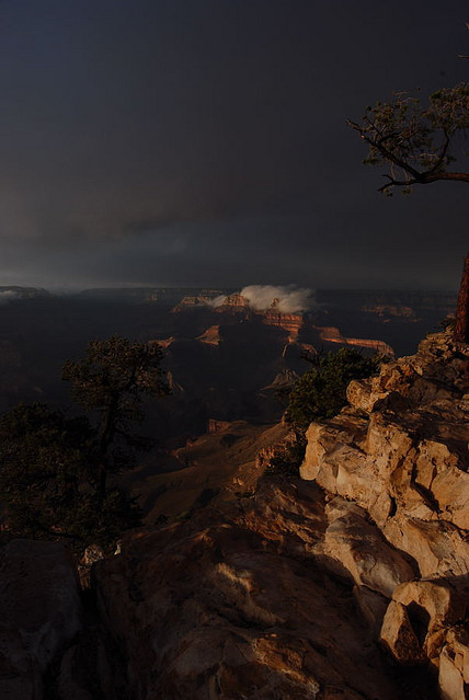 cliff, clouds and grand canyon