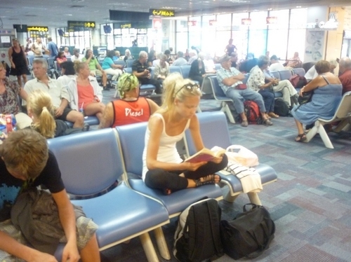 airport, blonde and book