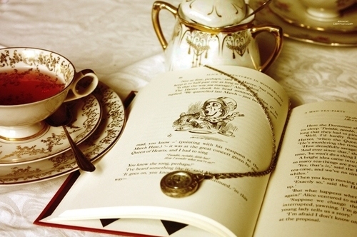 alice in wonderland, book and tea