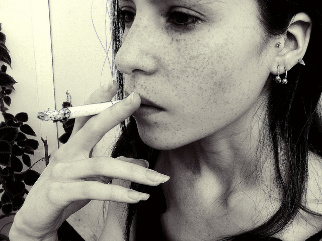 black and white, cigarette and earring