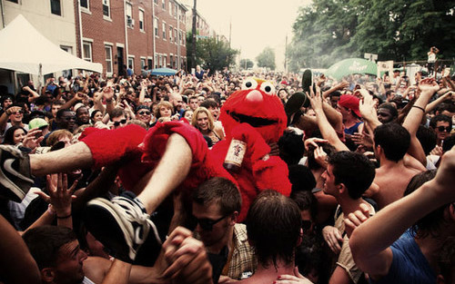 crowded,  drinking and  elmo