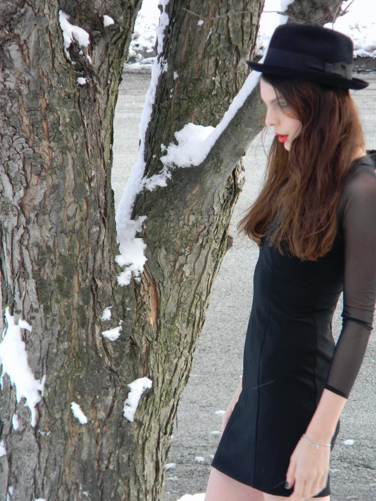 black dress, bowler hat and fashion