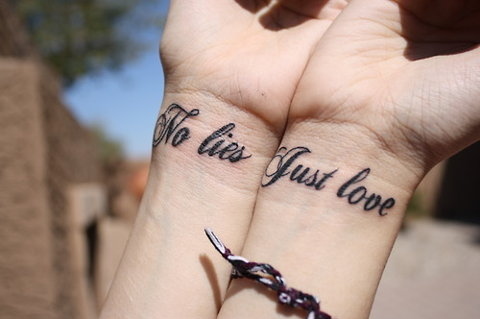 bright eyes just love no lies tattoo wrist tattoo