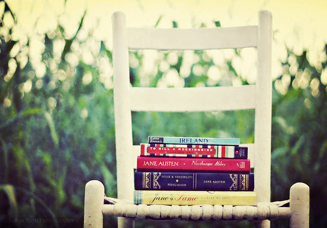 books, chair and field