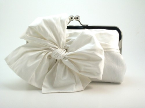 bow, clutch and girly