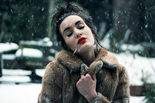 fur coat, red lipstick and snow