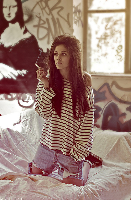 bed, boyfriend jeans and brunette