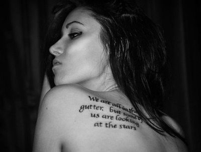 black and white quote saying shoulder tattoo