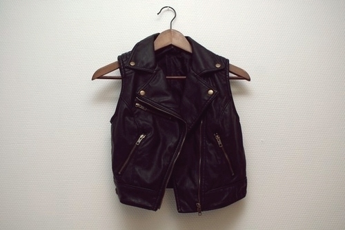 black, black and white and black leather vest