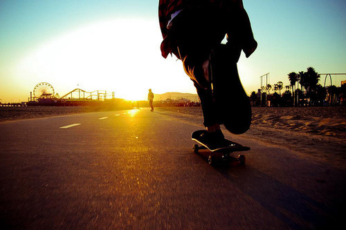 skateboarder, street and sun